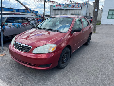 2005 4D Toyota Corolla red