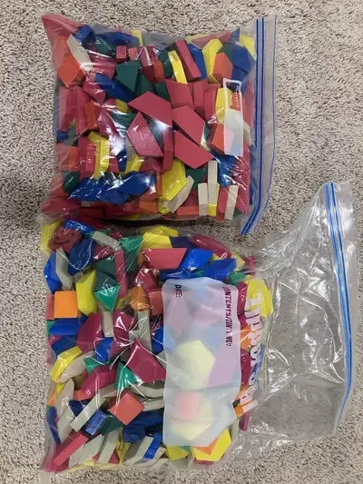 Large mixed collection of Pattern Blocks in wood and foam, approx. 500+ pieces total (two large bags...