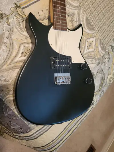 FirstAct electric guitar, good Student or beginners guitar . Model ME955 New strings pickup, cash ca...