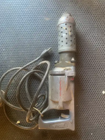 vintage antique Milwaukee rotary hammer drill, View more