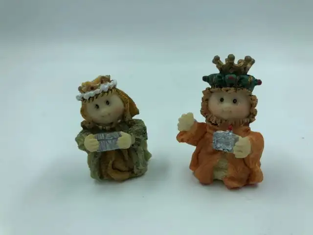 Two tiny Christmas figurines