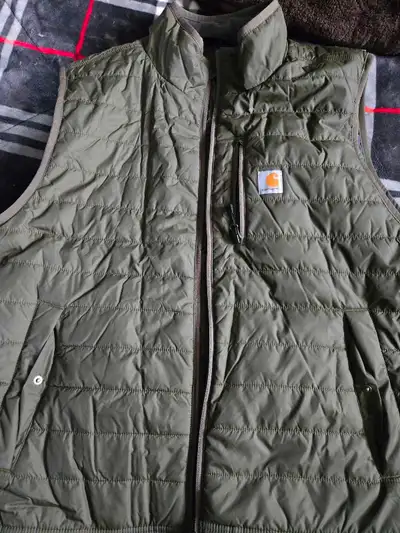 Carhartt vest, in excellent condition. Only worn one time. Lost weight and now it's too big. Size 2x...