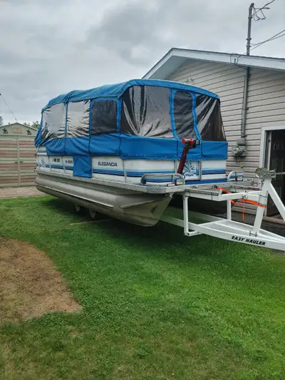 Covered 22' pontoon boat and scissor lift trailer 70hp johnson