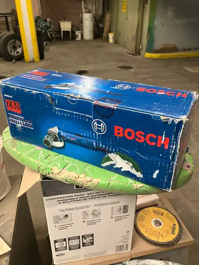 Here is a brand New Bosch 4 1/2” angle grinder that was bought but never used. It’s ready for your n...