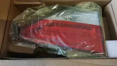 Rear tail-light plastic assembly for driver's side of Honda Odyssey. I needed the passenger side and...