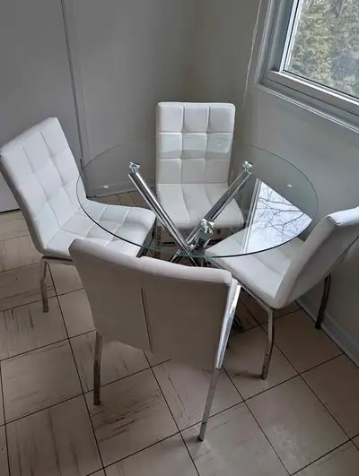 Elegant Round Glass Dining Table & White Chairs – Brand New, View more