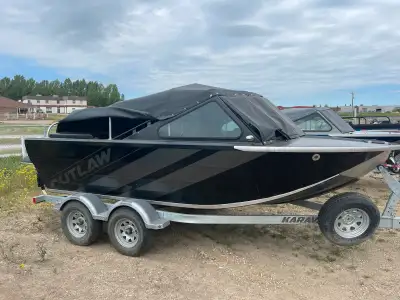 2022 Outlaw jet boat 16 foot with 300 Rotax, 8 degree bottom, full camper top, travel top, padded wi...