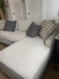 L shaped sectional Property Brother’s couch. 