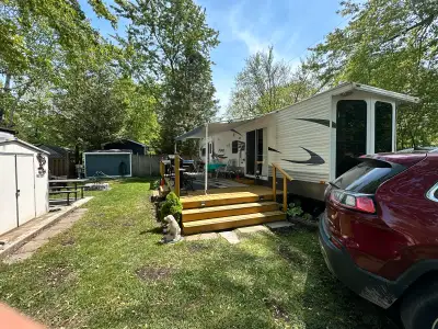 Asking $30,000. Lot fees paid for the year. 2011 Palomino Puma Park model trailer in condition. Two...