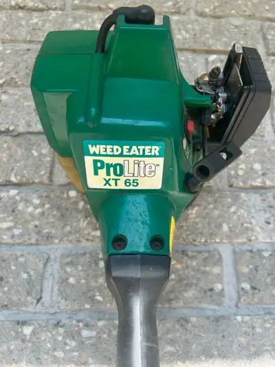 Weed Eater Pro Lite XT 65 string trimmer + carb kit, View more