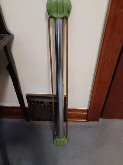 Bullworker isometric exerciser. 35" long 1970's original Tube in tube spring tension with side cable...