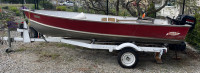 14’ wide body aluminum boat, motor, trailer, excellent shape.