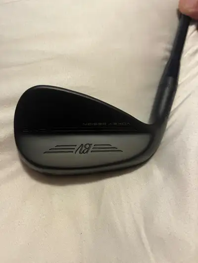 New never used 46 degree Vokey wedge. Upgraded Tour Issue Black Onix S400 shaft standard length, lie...