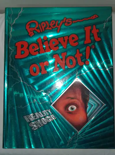 Large hardcover Ripley's Believe it or not books Eye pooing oddities and Reality Shock! Edition's