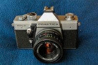 Practical MTL3 35 mm SLR film camera and 2 broken DSLRs w/ lens