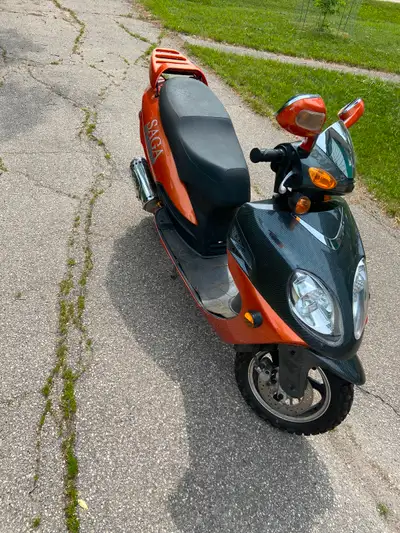 2011 Saga Deluxe 50 cc Scooter, about 9600 kms, CVT transmission, runs good, new battery, CVT belt h...