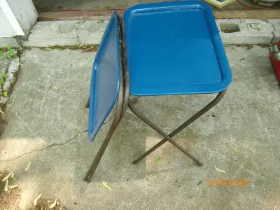 Vintage folding small tables in good condition. Can also be used as plant stands. 22" H X 15" W X 11...