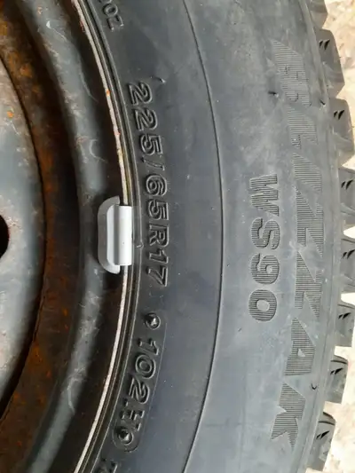 Set of four tires and rims. Some rust on the rims, but otherwise all in excellent condition. The rim...