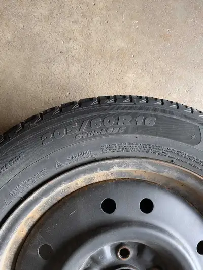 Set of used Michelin X winter tires on rims. Off of (Hyundai Elantra) 5x114.3 mm bolt pattern. 205x6...