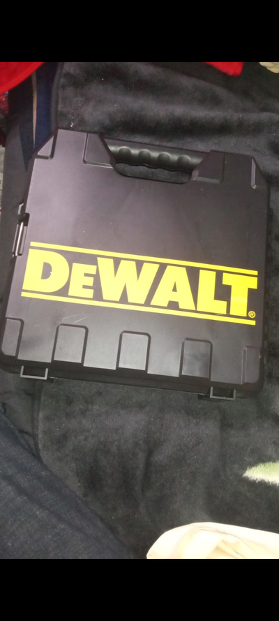 Like new plug in DeWalt drill case included, View more