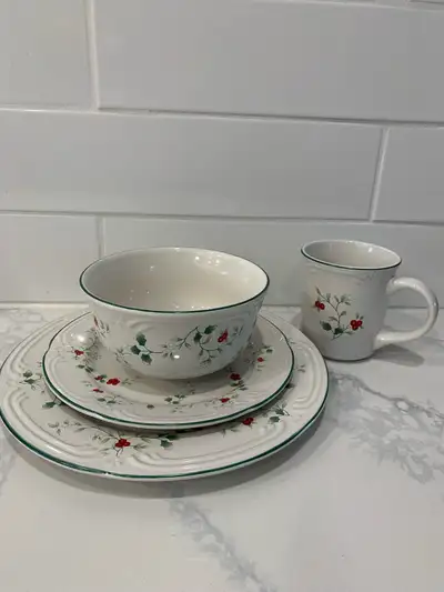Selling Christmas Winter Berry design 4pc 4 place settings - Pfaltzgraff New never used Asking $70.0...