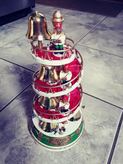 vintage Holiday Christmas music bell hop monkey bell Moneys goes around the tree and ring the bell a...