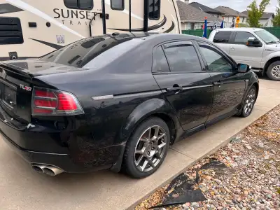 Has a damaged Wheel, subframe, and power steering pump. It moves under its own power, engine and tra...