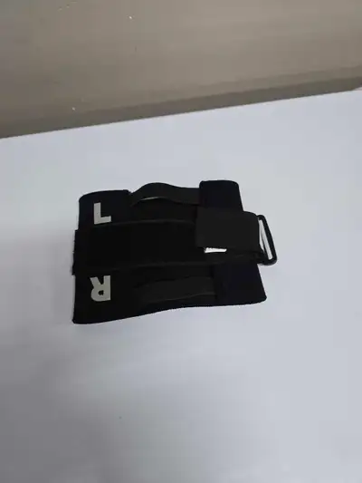Knee brace. For left or right knee. See other pictures for details. No holds. No deliveries. White C...