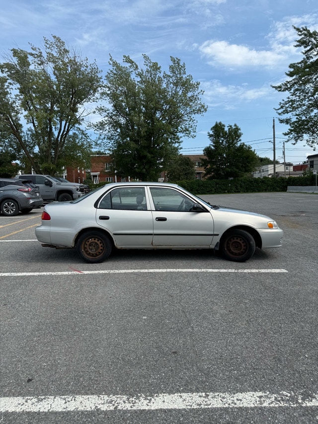 Toyota Corolla CE 2002 — photo 4