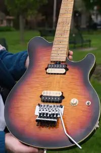 Ernie Ball Music Man Axis in Flame Vintage Sunburst with Tremolo