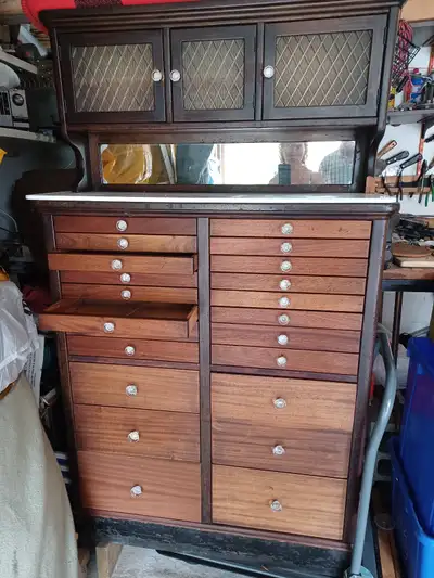 Selling a antique Dental Cabinet, View more