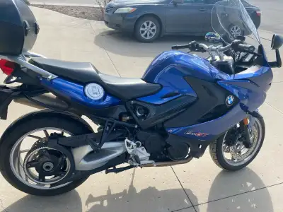 1 motorcycle BMW F800 2015 with hard case luggage