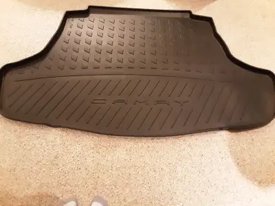 2024 Toyota Camry trunk liner, cargo netting and two front and two rear floor mats. Mats never used...