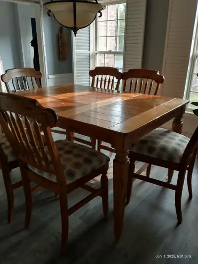 Pub style table with six chair Top of the needs a little love Good quality , heavy