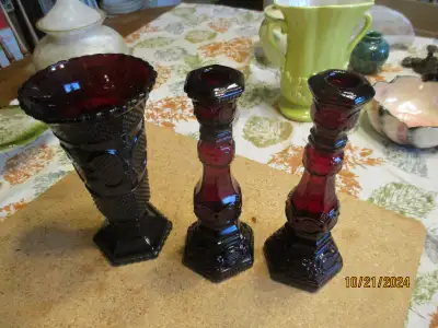 Selling quickly at $10.00 each......super condition as shown.........the large vase is 4 1/4 inches...