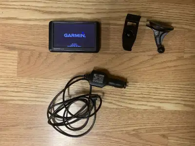Garmin nuvi 255W with car charger, dash holder - $50, View more