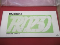1976   Suzuki  RM250  Owner's Manual in original bag.