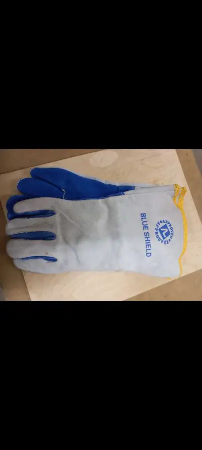 Offering a pair of Blue Shield welding gloves designed to provide excellent hand protection during w...