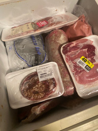 Small freezer full of meat for dogs or animals