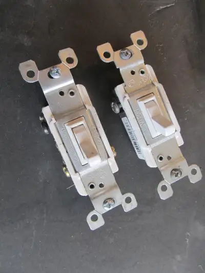 New never used 3-way toggle switch Levinton #1453 White selling as a pair for $ 3.00