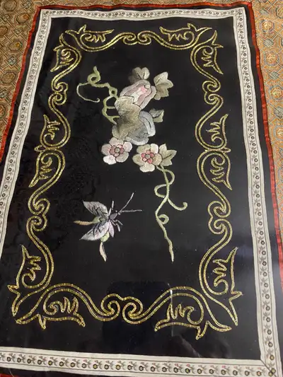 Fabric and coloured thread artwork with black cloth border under glass with brass metal frame. 16” w...