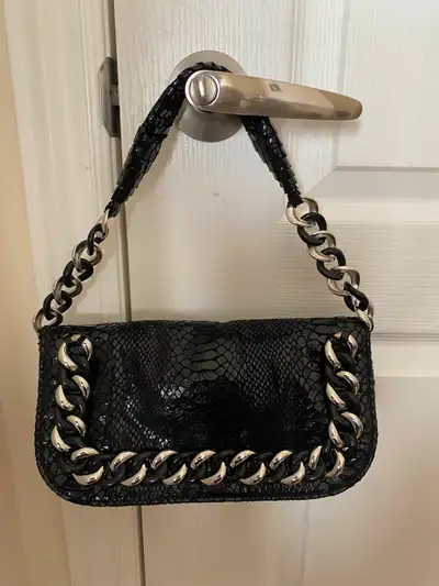 Black Snakeskin Clutch with Sliver Chain Detail, View more