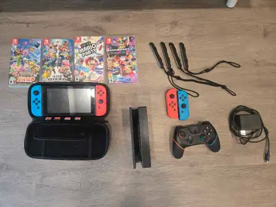 Nintendo Switch W/ 4 games and controllers, View more