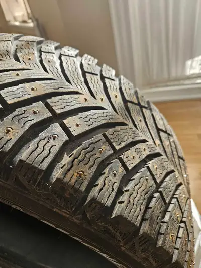 4 Winter Studded Tires - Excellent Condition!! Outstanding Tread!! Michelin X-Ice North Size: 215/50...