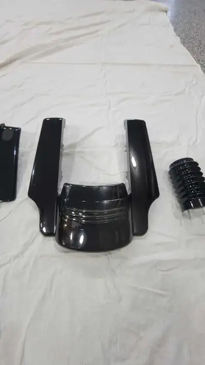 Came off a 16 road glide special 4.5" fender extension Stock side covers/SOLD Msg for prices and inf...