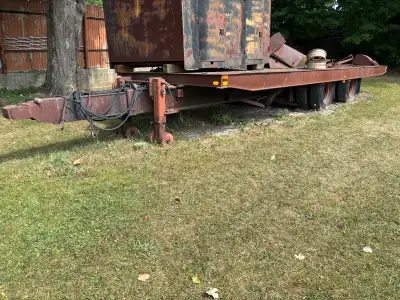 30 foot long flatbed tilt trailer has not operated in years bring an offer 519-927-9605