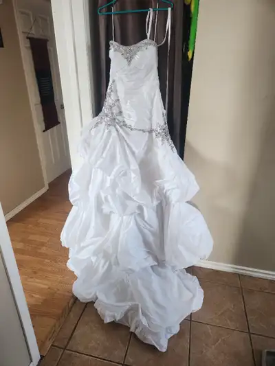 Gorgeous demetrios wedding dress. Size 8 Swarovski Crystals EVERYWHERE! I have others. Check out my...