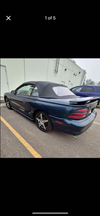 Mustang gt 5.0L convertible. New rims and tires, soft top installed last summer, new alternator, spa...