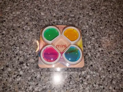 Here's a package of four coloured lenses for the Fujifilm Instax Mini 12 and 11 cameras.