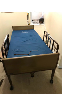 Invacare fully electric Hospital bed with mattress.